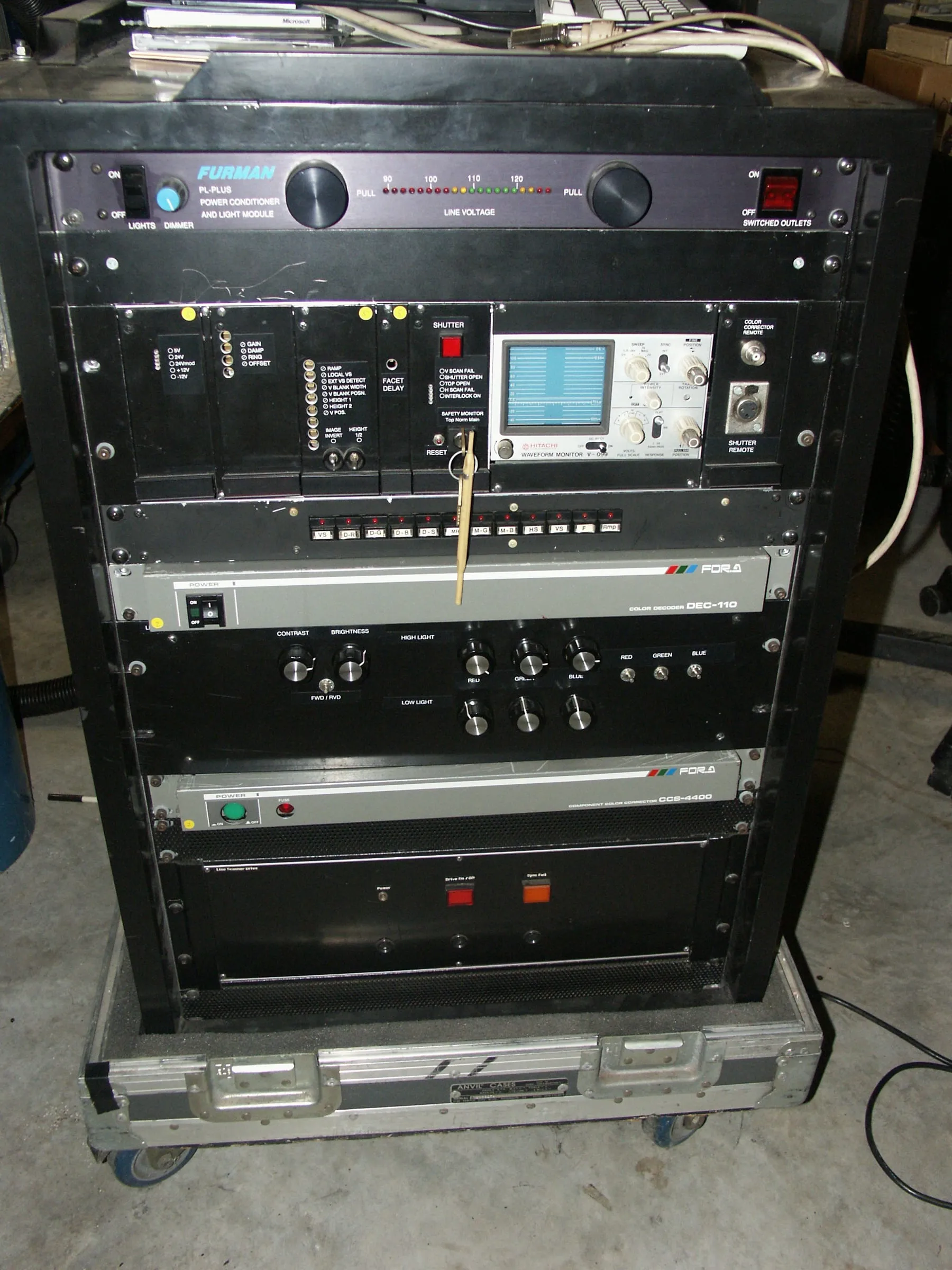 An equipment rack of laser video projection electronics.
