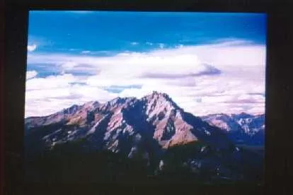 A full-color laser-projected mountain landscape.