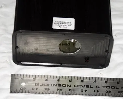 The Stingray II — Paul's self-contained YAG laser projector for aerial beams and fans, built to the ILDA standard. Front view, with a ruler for scale.